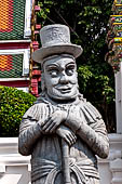 Bangkok Wat Pho, detail of the humorously-depicted Europeans looking door guardian  in between the eastern and the western court. 